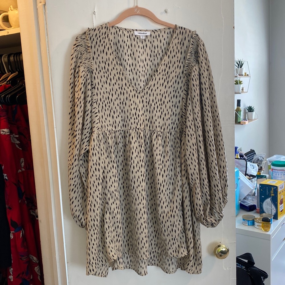 Tunic-style long sleeved blouse